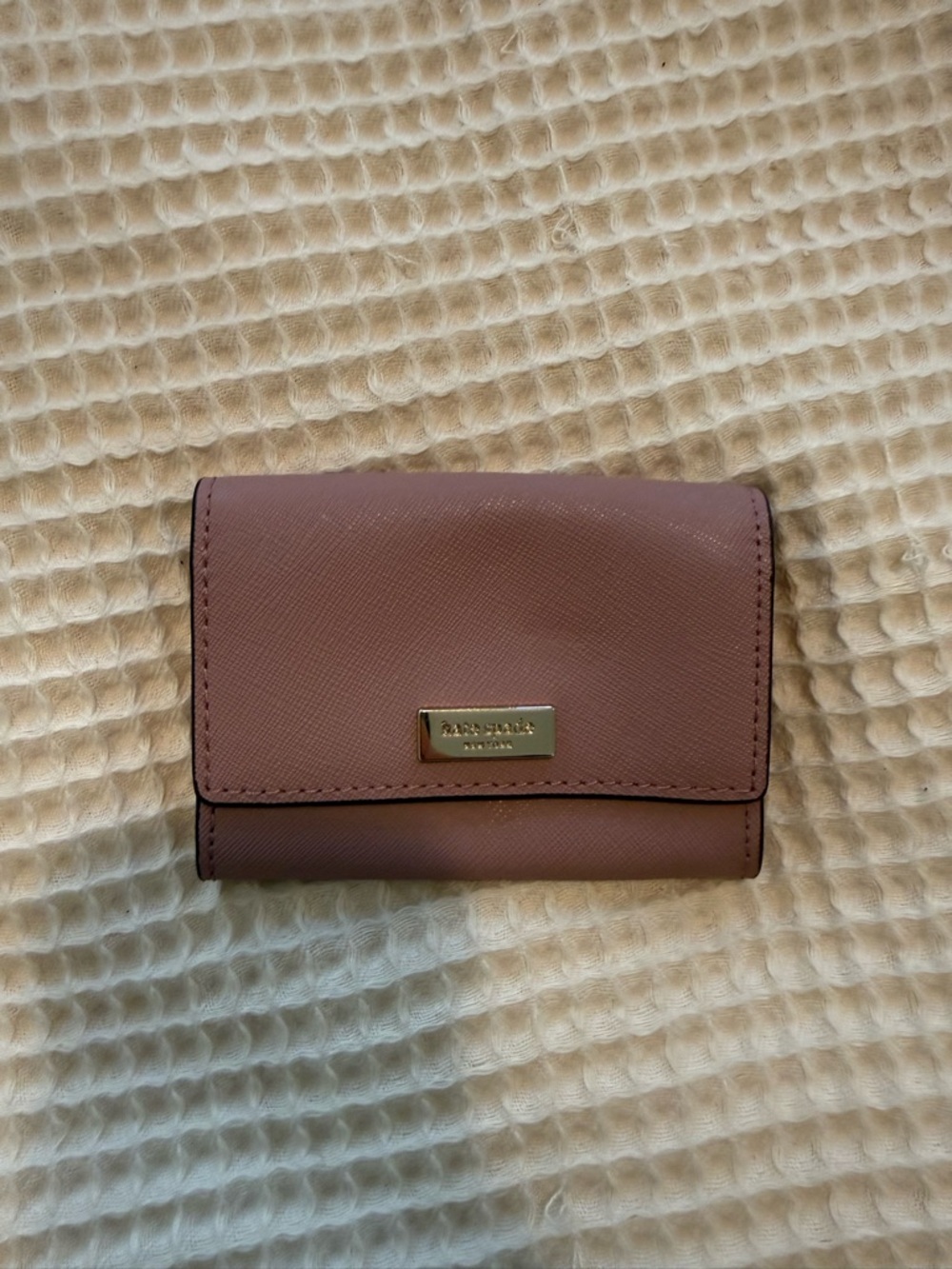 kate spade mauve pink leather compact wallet with gold plaque